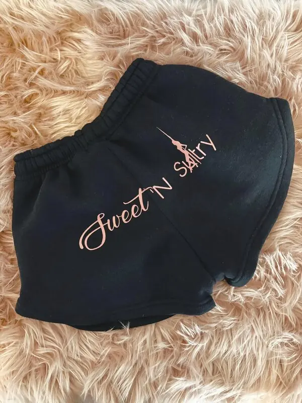 Black SNS booty shorts with pink logo